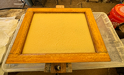 Sheetforming dyed paper pulp