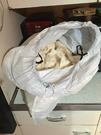 half O bag of raw cotton